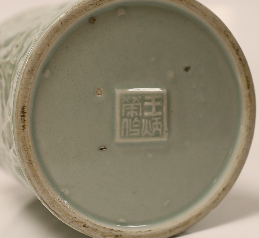 A Chinese celadon glazed brush pot, 15cm